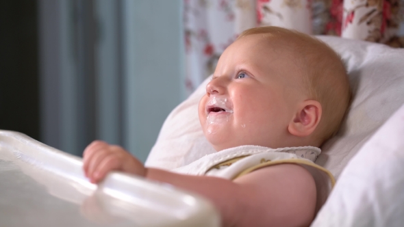 Adorable Toddler Eating Kefir