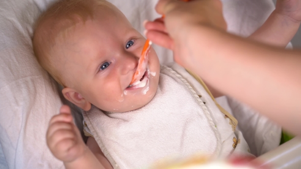 Adorable Toddler Eating Kefir