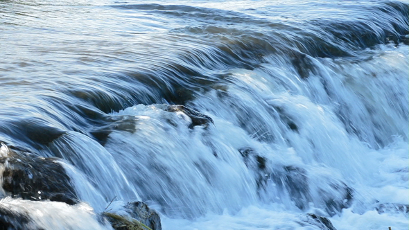 Water River in Running in Cascade at Sunset