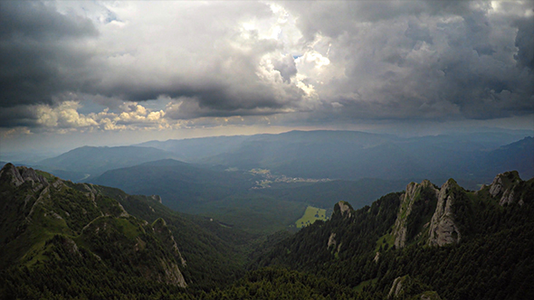 Aerial View of Mountains and Dramatic Clouds