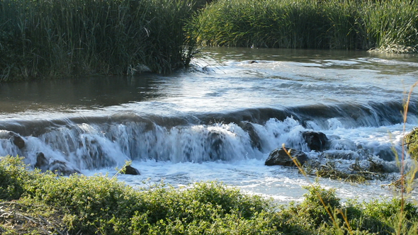 River with Cascade at Sunset