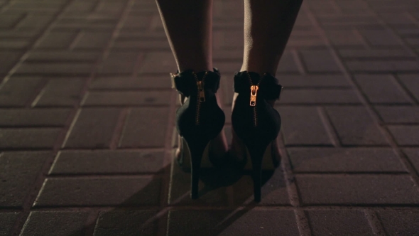  Women's Legs Walking Away At Night