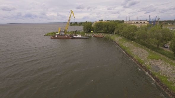 Aerial View. River Port With Cranes And Ships.