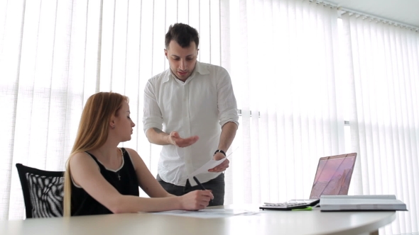 The Man Talking With Girl In The Office