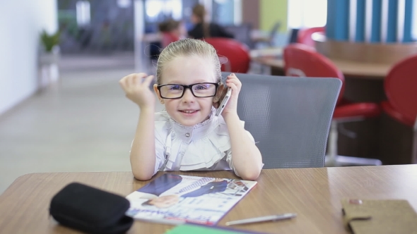 Office Kid Talking On Phone