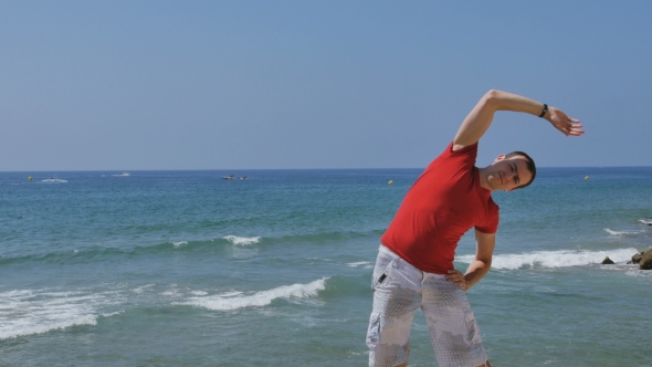 Athletic, Young, Healthy, Handsome, White Man Warming Up His Body Before The Training