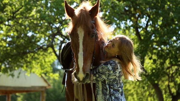 Girl Hugging a Horse