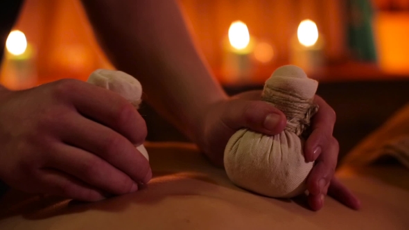 Herbal Bags Massage In Spa Salon