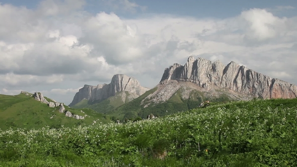 Mountains (Eastern And Western Acheshbok) Under a Blue Sky With Clouds