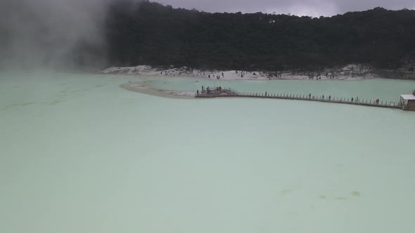 Aerial view fly through smoky in white crater, bandung, Indonesia