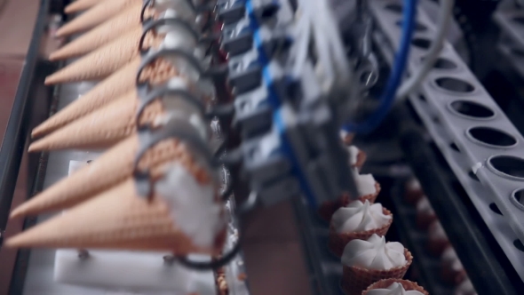 Modern Ice Cream Automatic Production Line. Automatic Equipment At The Food Factory.