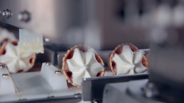 Modern Ice Cream Automatic Production Line. Automatic Equipment At The Food Factory.