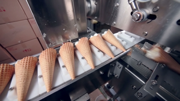 Modern Ice Cream Automatic Production Line. Automatic Equipment At The Food Factory.