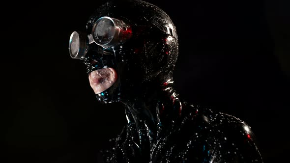 Role Playing Fantasy with Latex Suit and Face Mask Portrait of Woman in Darkness