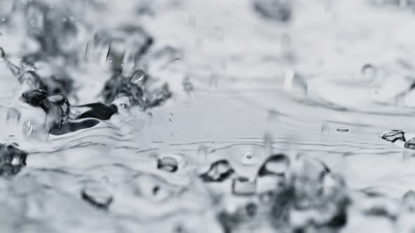 Macro Shot of Rain in Super Slow Motion Shooted with High Speed Cinema Camera at 1000Fps