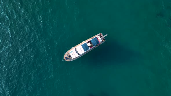 A large yacht stands at sea aerial view 4 K