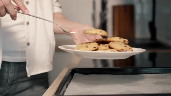 Young Housewife Making Homemade Cookies in Kitchen