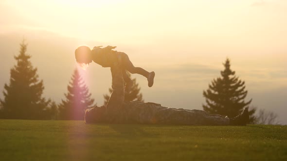 Military Daddy Picks Up Daughter in the Park