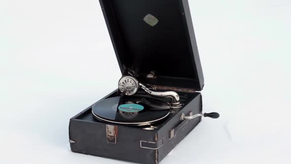 Old Gramophone Record Playing In The Snow 10