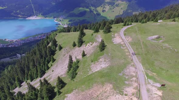 Aerial view of mountain bikers on a scenic singletrack trail