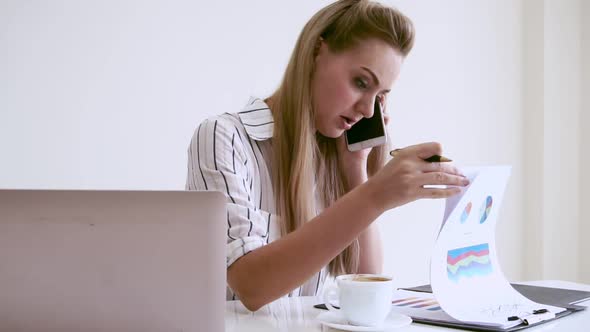 Blonde Business Woman Working at Modern Office