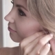 The Young Beautiful Woman Puts On Earrings - VideoHive Item for Sale