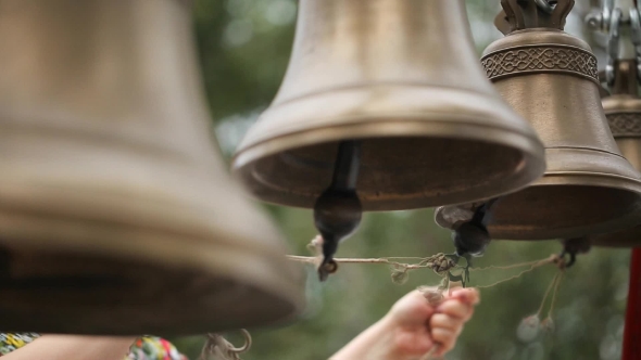 People Call In Brass Bells Pulling Ropes Which Connected With Its Tongues