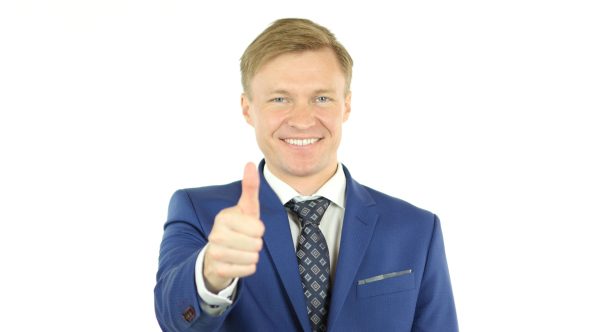 Thumbs up by Successful Businessman on white Background
