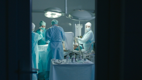 Medical Staff Working In Operating Room