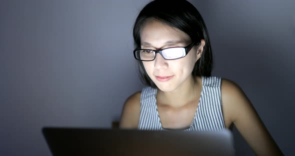 Woman using digital tablet computer at home 