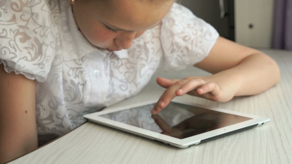 Little Girl Holding a Digital Tablet Computer