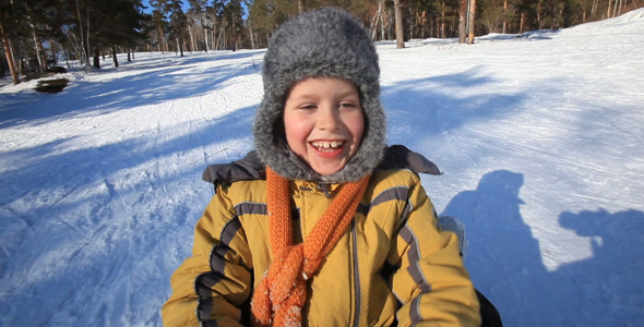 Boy On Sled