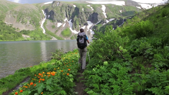 Hiker Woman Is Walking Mountain