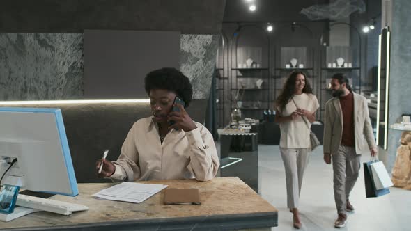 Woman Working in Jewelry Store