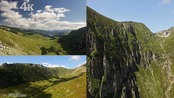 Landscapes with Shadows of Clouds over a Valley between Mountains