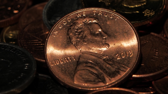 Copper Penny Is Seen In Glare Of Light. 