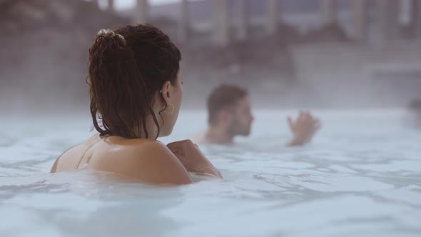 Couple Relaxing In Lagoon Geothermal Spa