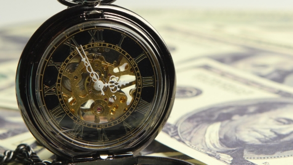 Watch Skeleton On a Background Of Money. 