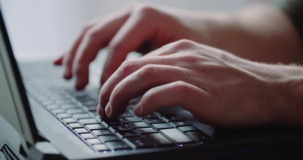 Business - Businessman Hands Type on Laptop Computer Close Up