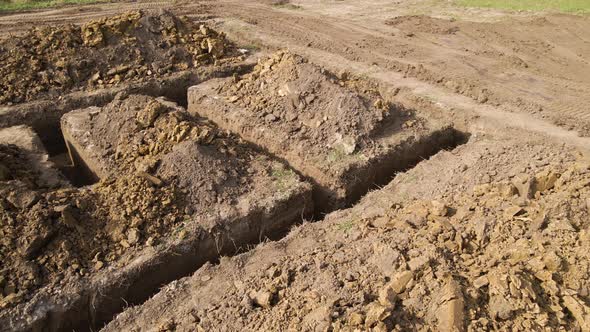 Dug Out Trench for Building Works of New House Concrete Foundation on Construction Site