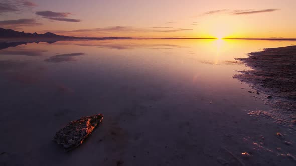 Water covering the Bonneville Salt Flats reflecting at sunrise