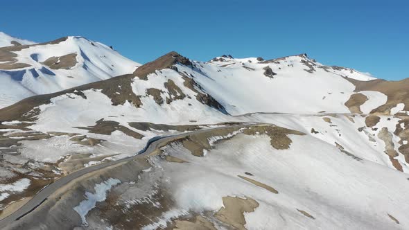 Aerial View of Mountains Aerial Snow Covered Mountain Peaks in Alps in Winter