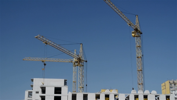 Working Construction Cranes.