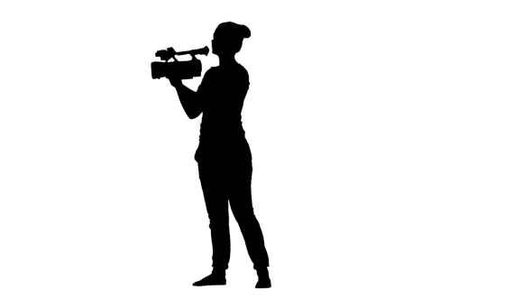 Operator Makes The Video Camera Rotating 180 Degrees. Silhouette. White