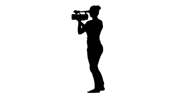 Girl Operator Makes Videotaping, Holding Camera In Hands. Silhouette. White