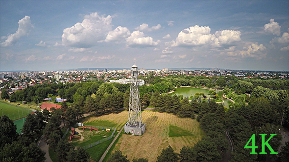 Aerial Sentinel Post in the Middle Of Green City