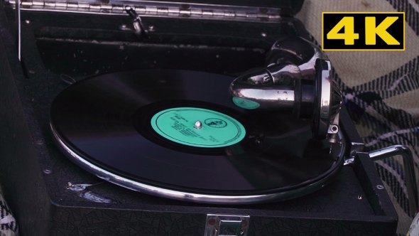 Old Record Spinning On a Real Gramophone. Retro Style