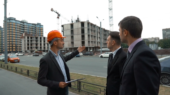 Architector In Helmet Presents To Customers Their Building