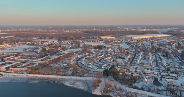 Aerial View Snow Covered Roofs of Houses a Winter Day