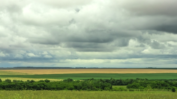 Movement Of Clouds Over The Fields Harvesting Of Grain Bread